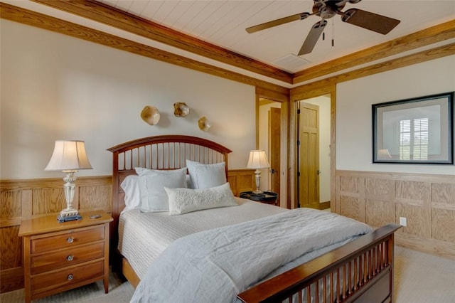 143 Button Bush Trl, Six Mile, SC 29682 - bedroom with wainscoting, carpet, a ceiling fan, and wooden walls