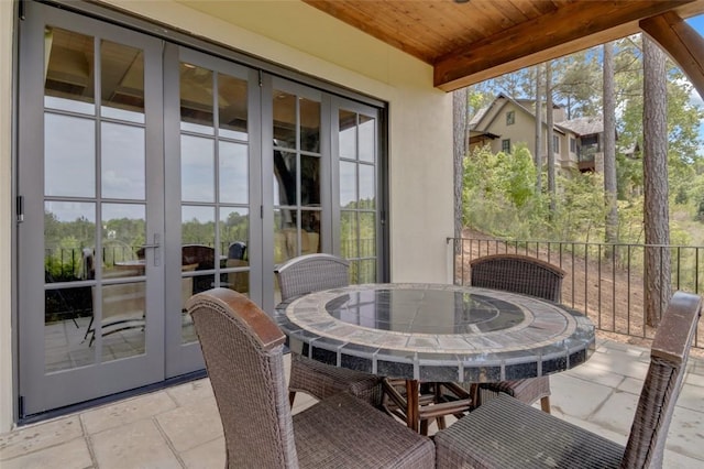 143 Button Bush Trl, Six Mile, SC 29682 - sunroom featuring french doors and outdoor dining area