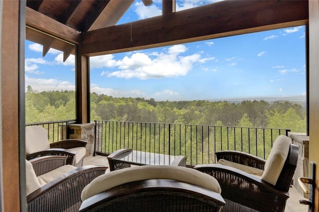 143 Button Bush Trl, Six Mile, SC 29682 - sunroom / solarium with a wooded view and plenty of natural light