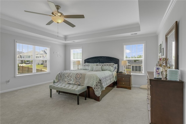 400 N Oak Crest Dr, Belton, SC 29627 - bedroom featuring a tray ceiling, crown molding, light colored carpet, multiple windows, and baseboards