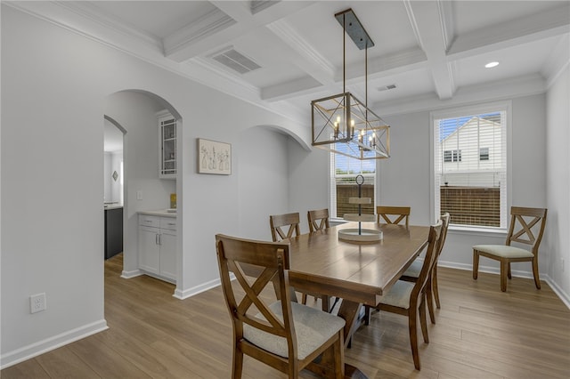 400 N Oak Crest Dr, Belton, SC 29627 - dining area with light wood finished floors, beam ceiling, coffered ceiling, arched walkways, and recessed lighting