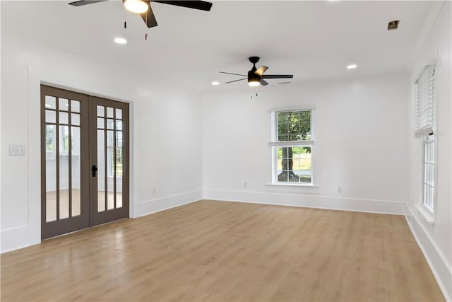 701 S Townville St, Seneca, SC 29678 - spare room featuring french doors, a ceiling fan, light wood-type flooring, recessed lighting, and baseboards