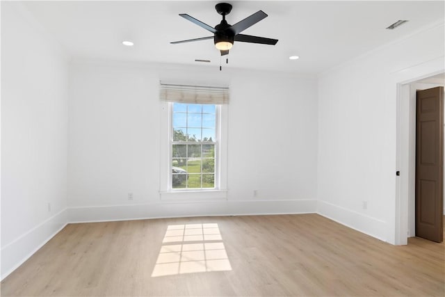 701 S Townville St, Seneca, SC 29678 - empty room with light wood finished floors, crown molding, baseboards, a ceiling fan, and recessed lighting