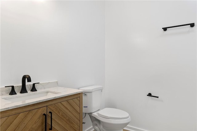 701 S Townville St, Seneca, SC 29678 - bathroom featuring vanity, toilet, and baseboards