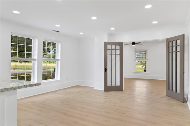 701 S Townville St, Seneca, SC 29678 - empty room featuring light wood-type flooring, baseboards, recessed lighting, crown molding, and ceiling fan