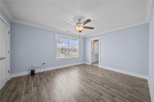 406 Bee Cove Way, Pendleton, SC 29670 - unfurnished bedroom featuring ornamental molding, dark wood-type flooring, baseboards, ensuite bath, and ceiling fan