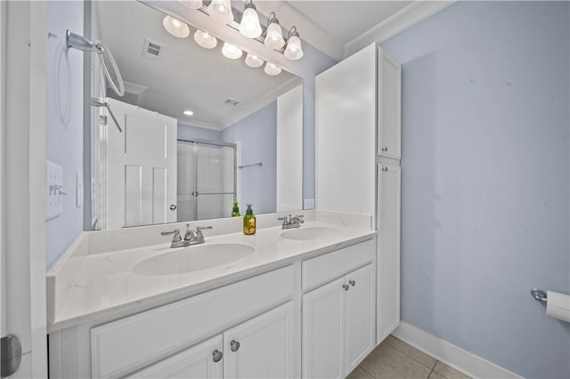 406 Bee Cove Way, Pendleton, SC 29670 - bathroom with crown molding, double vanity, tile patterned flooring, an enclosed shower, and baseboards