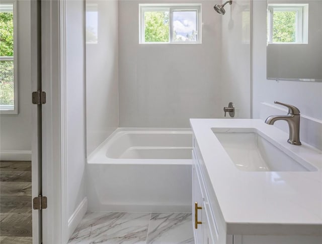 107A Avondale Rd, Anderson, SC 29624 - bathroom with a bath, vanity, plenty of natural light, and marble look tile flooring