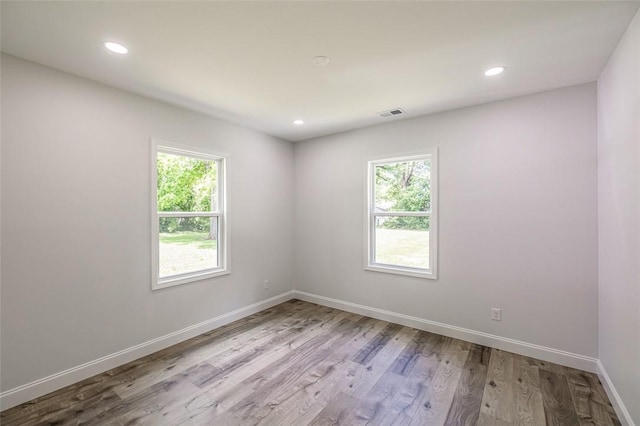 107A Avondale Rd, Anderson, SC 29624 - spare room featuring plenty of natural light, baseboards, wood finished floors, and recessed lighting