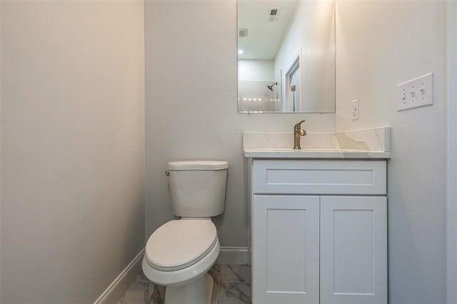 107A Avondale Rd, Anderson, SC 29624 - bathroom with baseboards, marble finish floors, vanity, and toilet