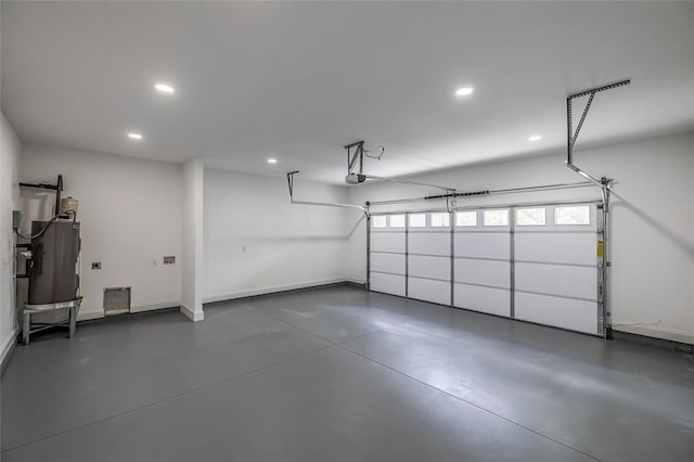 107A Avondale Rd, Anderson, SC 29624 - garage with recessed lighting, a garage door opener, and baseboards