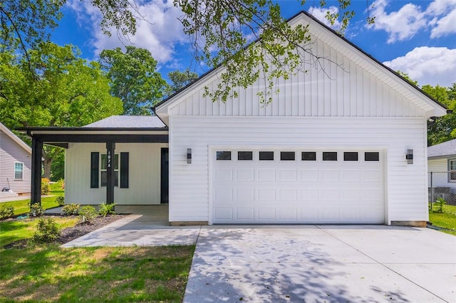 107A Avondale Rd, Anderson, SC 29624 - view of front of home with an attached garage, driveway, and board and batten siding