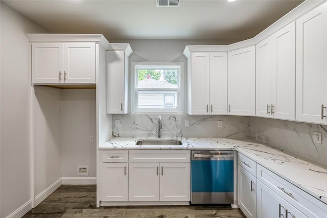 107A Avondale Rd, Anderson, SC 29624 - kitchen with dishwasher, a sink, white cabinets, and backsplash
