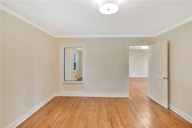 2400 Lane Ave, Anderson, SC 29621 - spare room featuring light wood-style floors, ornamental molding, and baseboards