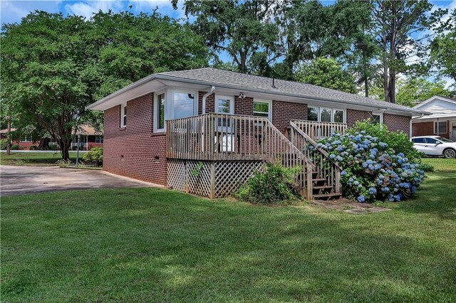 2400 Lane Ave, Anderson, SC 29621 - back of house with brick siding, a yard, a deck, and stairs