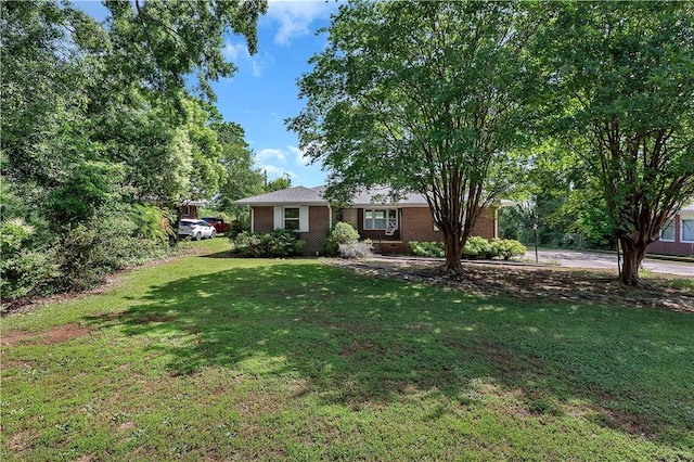 2400 Lane Ave, Anderson, SC 29621 - view of front facade with a front yard and brick siding