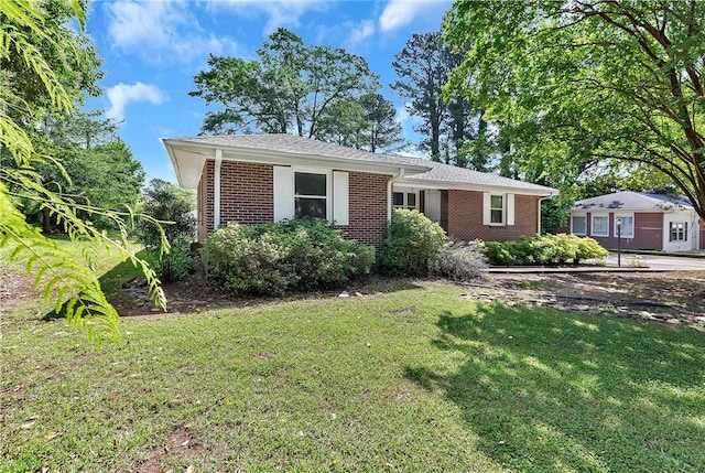 2400 Lane Ave, Anderson, SC 29621 - ranch-style house featuring brick siding and a front lawn
