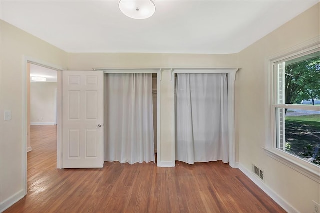 2400 Lane Ave, Anderson, SC 29621 - unfurnished bedroom featuring wood finished floors, baseboards, and a closet