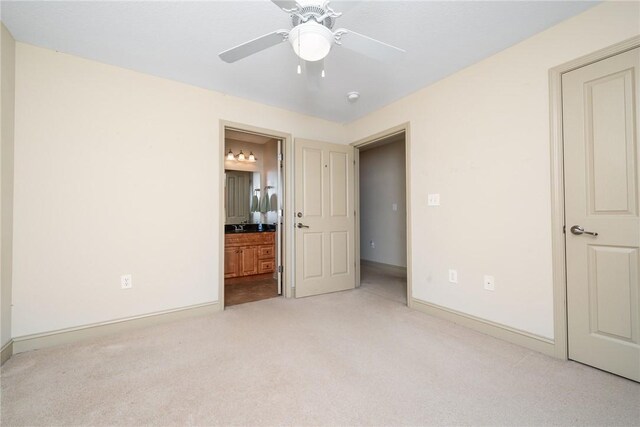 1523 Gadwell Way, Seneca, SC 29678 - unfurnished bedroom with light colored carpet, baseboards, ensuite bath, and a ceiling fan