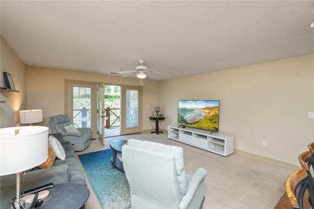 1523 Gadwell Way, Seneca, SC 29678 - living area featuring a ceiling fan, light colored carpet, french doors, baseboards, and a textured ceiling