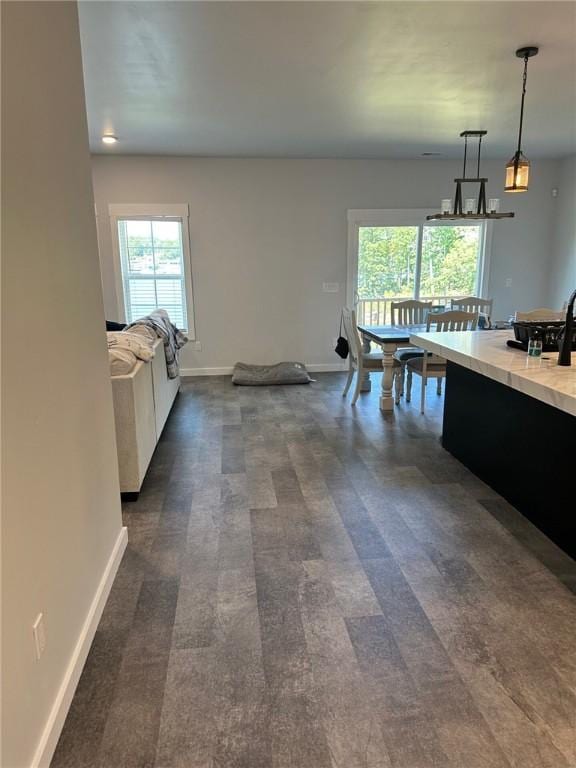 70 Creek Point Dr, Abbeville, SC 29620 - kitchen with healthy amount of natural light, baseboards, decorative light fixtures, and light countertops