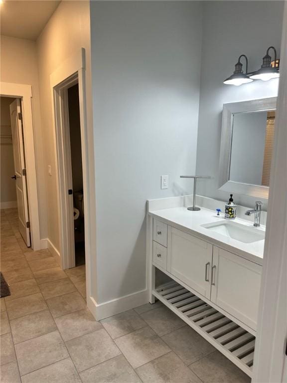 70 Creek Point Dr, Abbeville, SC 29620 - bathroom with vanity, baseboards, and tile patterned floors
