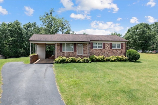 134 Grasshopper Hill Rd, Pickens, SC 29671 - ranch-style home featuring a front lawn, asphalt driveway, and brick siding