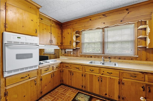134 Grasshopper Hill Rd, Pickens, SC 29671 - kitchen featuring open shelves, white appliances, a sink, brick patterned flooring, and plenty of natural light