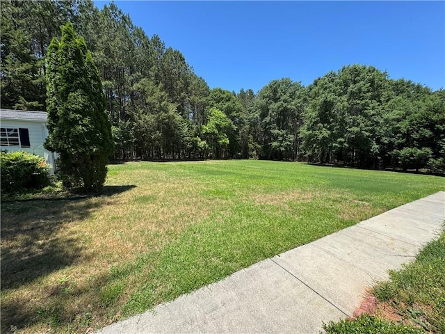 106 Dewars Trl, Anderson, SC 29621 - view of grassy yard featuring a wooded view