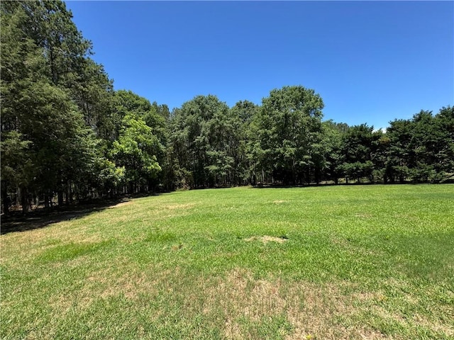 106 Dewars Trl, Anderson, SC 29621 - view of green lawn featuring a wooded view