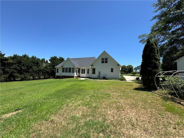 106 Dewars Trl, Anderson, SC 29621 - rear view of house featuring a lawn