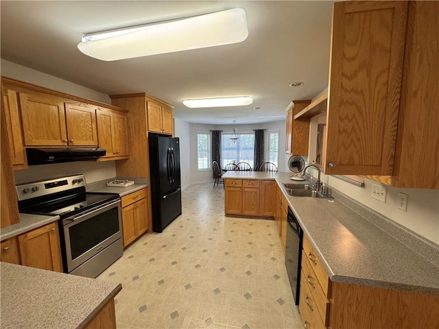 106 Dewars Trl, Anderson, SC 29621 - kitchen featuring black appliances, a sink, extractor fan, a peninsula, and light floors