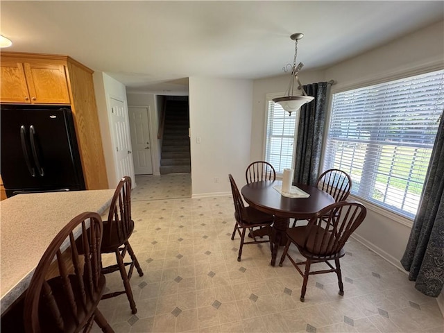 106 Dewars Trl, Anderson, SC 29621 - dining area featuring baseboards, stairs, and light flooring