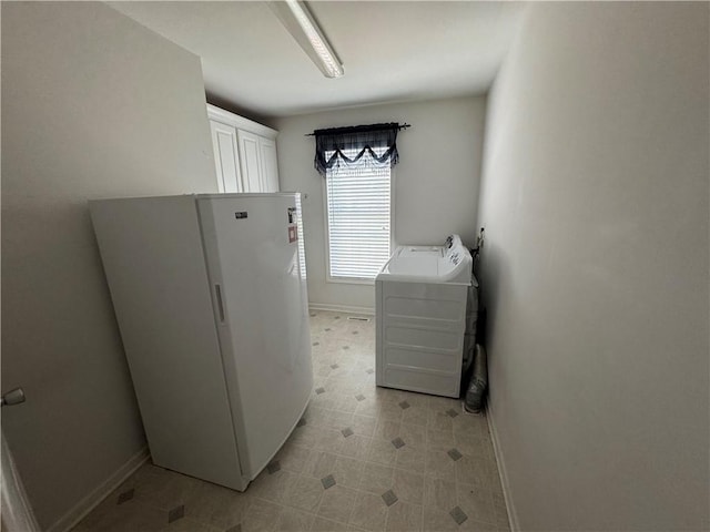 106 Dewars Trl, Anderson, SC 29621 - laundry room with cabinet space, baseboards, and independent washer and dryer