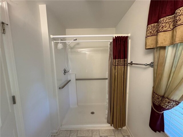 106 Dewars Trl, Anderson, SC 29621 - bathroom featuring a shower with curtain and baseboards