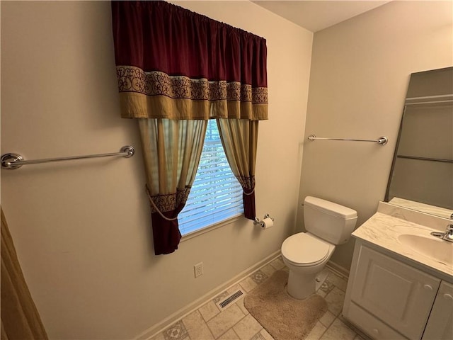 106 Dewars Trl, Anderson, SC 29621 - bathroom with toilet, baseboards, and vanity