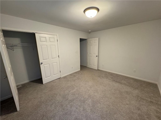106 Dewars Trl, Anderson, SC 29621 - unfurnished bedroom with carpet flooring, a closet, and baseboards
