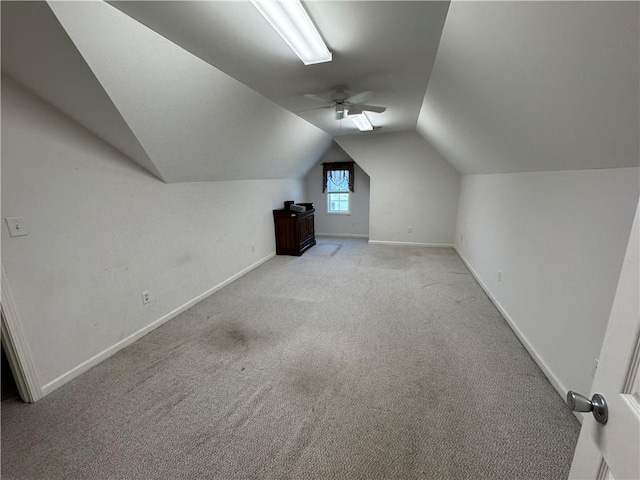 106 Dewars Trl, Anderson, SC 29621 - additional living space featuring light carpet, lofted ceiling, baseboards, and ceiling fan