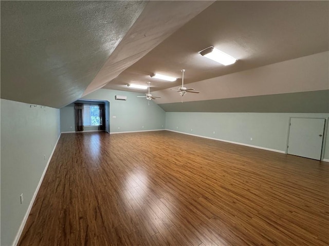 106 Dewars Trl, Anderson, SC 29621 - bonus room featuring wood finished floors, vaulted ceiling, baseboards, ceiling fan, and a textured ceiling