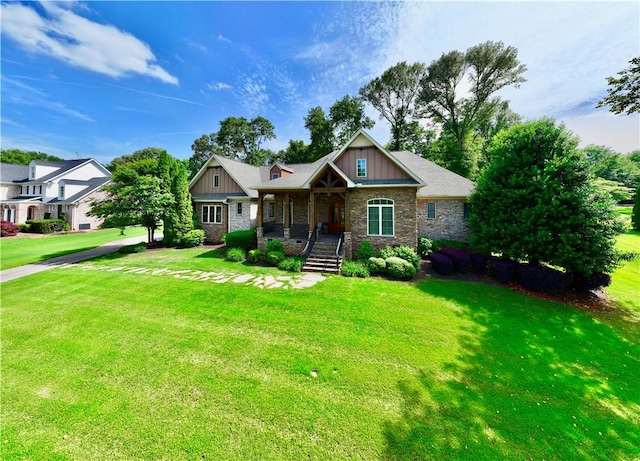 122 Langwell Dr, Anderson, SC 29621 - craftsman inspired home with covered porch, board and batten siding, a front yard, and stone siding