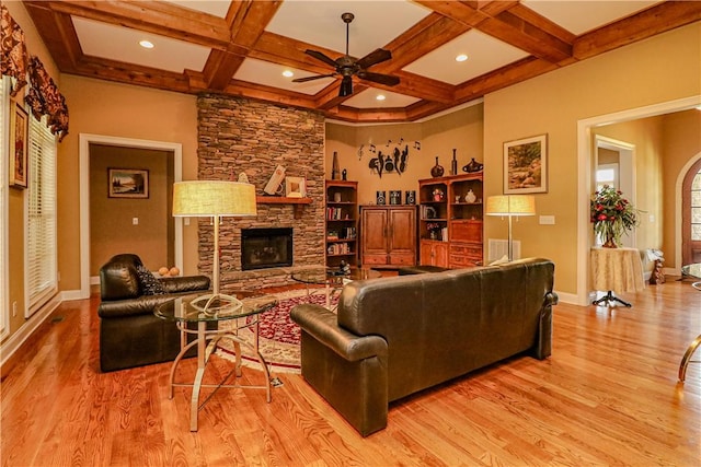 122 Langwell Dr, Anderson, SC 29621 - living room with a ceiling fan, light wood-style floors, baseboards, a fireplace, and beamed ceiling