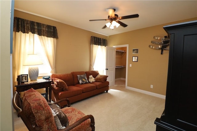 122 Langwell Dr, Anderson, SC 29621 - living area featuring a ceiling fan, plenty of natural light, light carpet, and baseboards