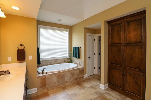 122 Langwell Dr, Anderson, SC 29621 - bathroom with a garden tub, vanity, tile patterned floors, baseboards, and recessed lighting