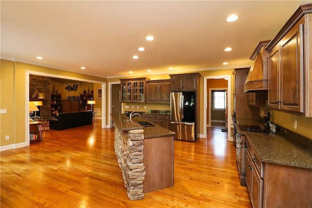122 Langwell Dr, Anderson, SC 29621 - kitchen with stainless steel refrigerator, a sink, custom exhaust hood, ornamental molding, and recessed lighting