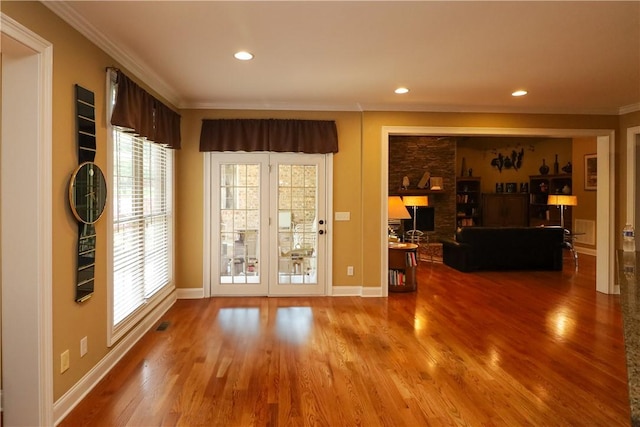 122 Langwell Dr, Anderson, SC 29621 - living room with crown molding, wood finished floors, healthy amount of natural light, baseboards, and recessed lighting
