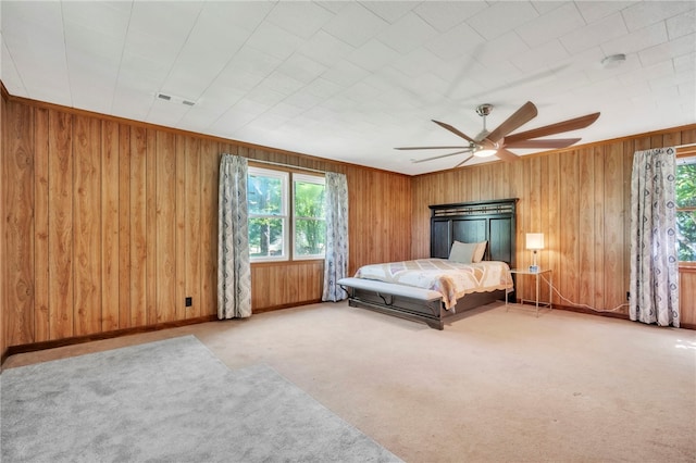 466 Whetstone Rd, Mountain Rest, SC 29664 - bedroom featuring multiple windows, carpet flooring, wood walls, a ceiling fan, and baseboards