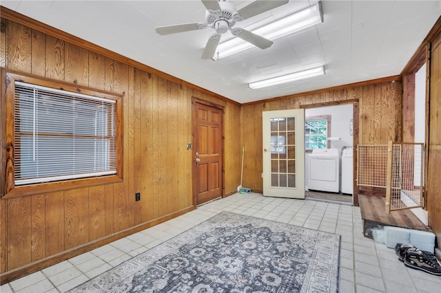 466 Whetstone Rd, Mountain Rest, SC 29664 - tiled foyer with washing machine and dryer, wooden walls, and a ceiling fan
