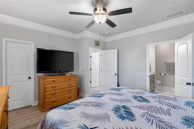 133 Shipyard Cir, Anderson, SC 29621 - bedroom with ornamental molding, light wood-type flooring, connected bathroom, a ceiling fan, and baseboards