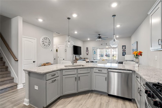 133 Shipyard Cir, Anderson, SC 29621 - kitchen with stainless steel appliances, a sink, a ceiling fan, light wood finished floors, and gray cabinets