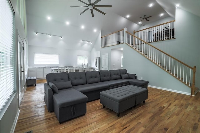 425 Lakewood Dr, Townville, SC 29689 - living room featuring a ceiling fan, high vaulted ceiling, wood finished floors, stairs, and recessed lighting